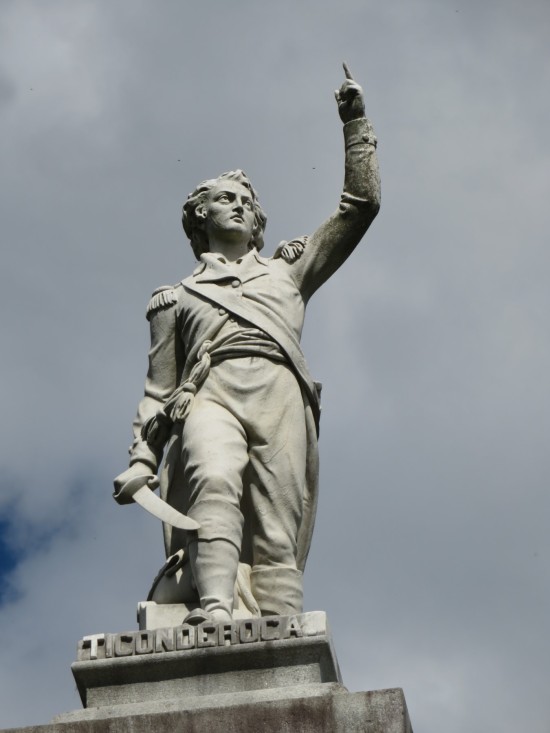 The Ethan Allen statue up close, pointing skyward.